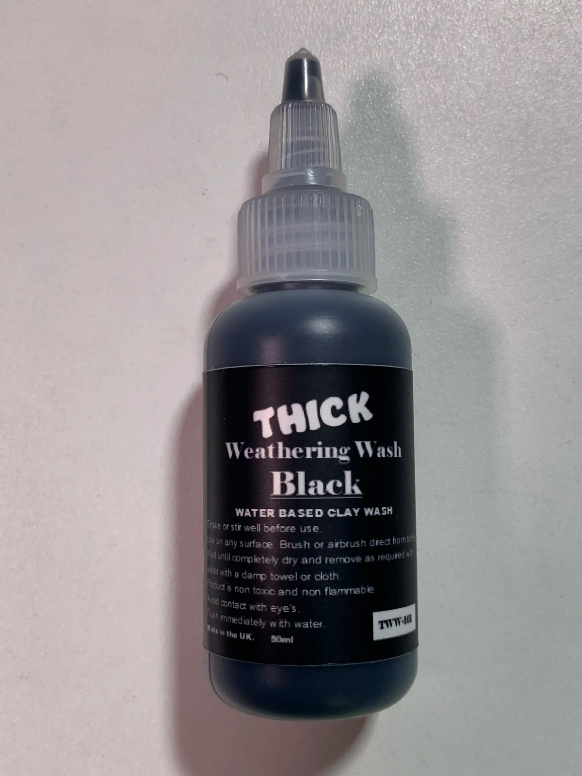 Flory Models Thick Black Weathering Wash TWW101 bottle for dramatic black weathering effects on scale models