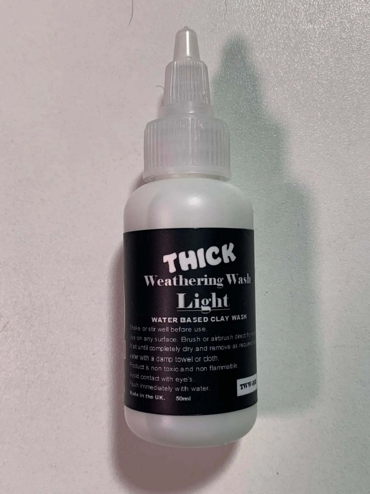 Flory Models Thick Light Weathering Wash TWW103 bottle for subtle light shading and dust effects on scale models
